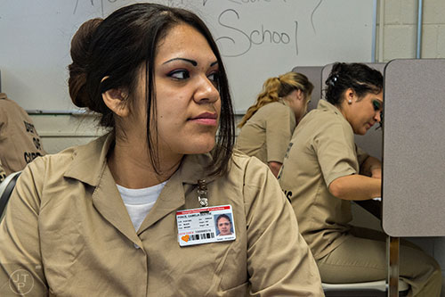 Camelia Ponce talks about getting her high school diploma through the charter school program at the Lee Arrendale Correctional Facility in Alto on Friday, April 10, 2015. 