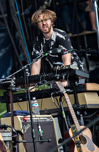 The Revivalists'  Michael Girardot performs on stage during the last day of the SweetWater 420 Fest at Centennial Olympic Park in Atlanta on Sunday, April 19, 2015. 