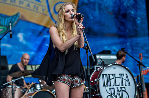 Delta Rae's Brittany Holljes performs on stage during the last day of the SweetWater 420 Fest at Centennial Olympic Park in Atlanta on Sunday, April 19, 2015. 