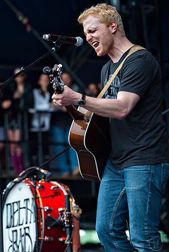 Delta Rae's Ian Holljes performs on stage during the last day of the SweetWater 420 Fest at Centennial Olympic Park in Atlanta on Sunday, April 19, 2015.