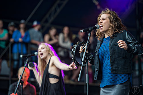 Delta Rae's Elizabeth Hopkins (right), Brittany Holljes and her brother Eric perform on stage during the last day of the SweetWater 420 Fest at Centennial Olympic Park in Atlanta on Sunday, April 19, 2015.