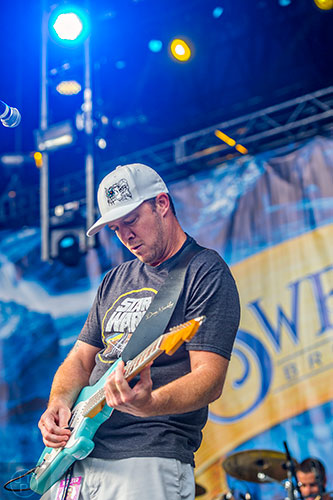 Slightly Stoopid's Miles Doughty performs on stage during the last day of the SweetWater 420 Fest at Centennial Olympic Park in Atlanta on Sunday, April 19, 2015. 