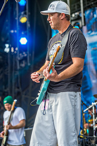 Slightly Stoopid's Miles Doughty (right) and Kyle McDonald perform on stage during the last day of the SweetWater 420 Fest at Centennial Olympic Park in Atlanta on Sunday, April 19, 2015. 