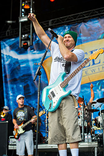 Slightly Stoopid's Kyle McDonald (right) and Miles Doughty perform on stage during the last day of the SweetWater 420 Fest at Centennial Olympic Park in Atlanta on Sunday, April 19, 2015. 