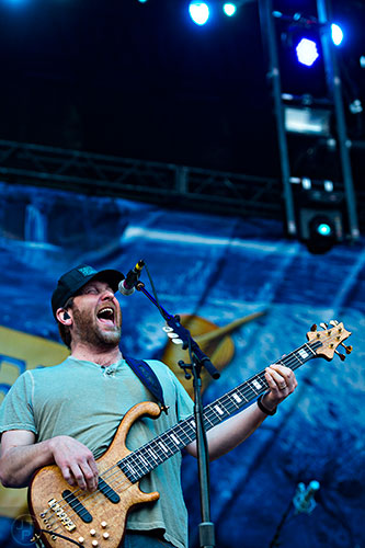 Moe.'s Rob Derhak performs on stage during the last day of the SweetWater 420 Fest at Centennial Olympic Park in Atlanta on Sunday, April 19, 2015. 
