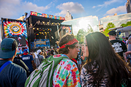 Duilan Fant (left) and Pilar Lopez-Gomez watch Slightly Stoopid perform during the last day of the SweetWater 420 Fest at Centennial Olympic Park in Atlanta on Sunday, April 19, 2015. 