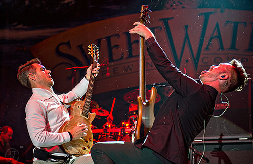311's Nick Hexum (left) and P-Nut perform on stage during the last day of the SweetWater 420 Fest at Centennial Olympic Park in Atlanta on Sunday, April 19, 2015. 