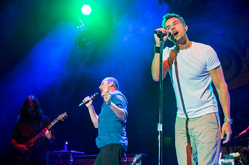 311's Nick Hexum (right), S.A. Martinez and Tim Mahoney perform on stage during the last day of the SweetWater 420 Fest at Centennial Olympic Park in Atlanta on Sunday, April 19, 2015. 