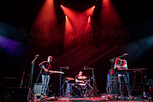 The Antlers' Peter Silberman (left), Michael Lerner and Darby Cicci perform on stage at the Fox Theatre in Atlanta on Monday, April 27, 2015. 