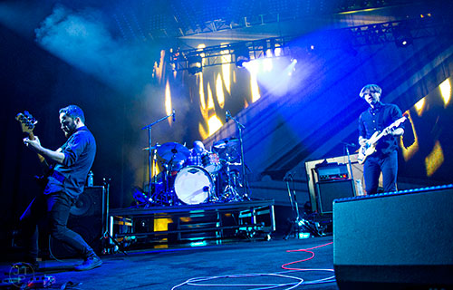 Death Cab for Cutie's Nick Harmer (left), Jason McGerr and Ben Gibbard perform on stage at the Fox Theatre in Atlanta on Monday, April 27, 2015. 