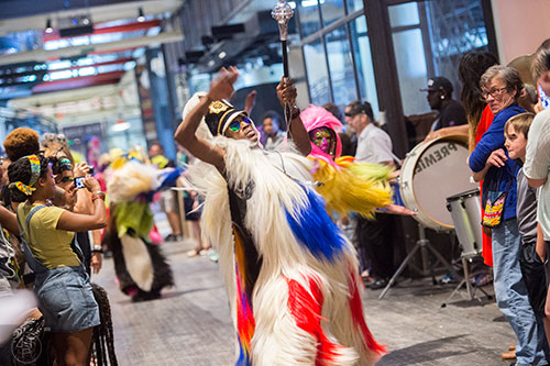 Rikki McKinney (center) performs during Nick Cave's Up Right: Atlanta performance at Ponce City Market on Sunday, April 26, 2015.