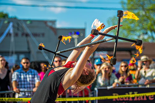 Charlotte Dillard performs with fire during the Fire in the Fourth Festival in the Old Fourth Ward neighborhood of Atlanta on Saturday, May 2, 2015. 