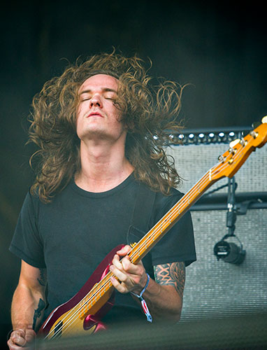 Manchester Orchestra's Andy Prince performs during the first day of the Shaky Knees Music Festival at Central Park in Atlanta on Friday, May 8, 2015. 