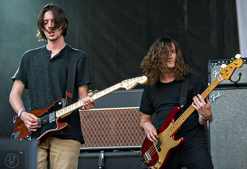Manchester Orchestra's Robert McDowell (left) and Andy Prince perform during the first day of the Shaky Knees Music Festival at Central Park in Atlanta on Friday, May 8, 2015. 