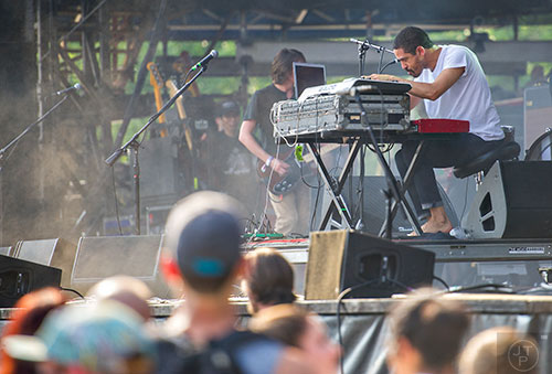 Manchester Orchestra's Chris Freeman performs during the first day of the Shaky Knees Music Festival at Central Park in Atlanta on Friday, May 8, 2015. 