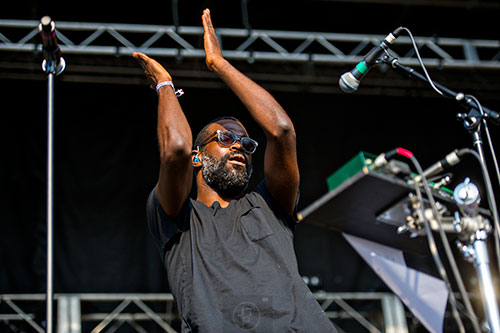 TV on the Radio's Tunde Adebimpe performs on stage during the first day of the Shaky Knees Music Festival at Central Park in Atlanta on Friday, May 8, 2015. 