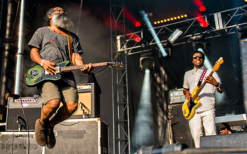 TV on the Radio's Kyp Malone (left) and Jaleel Bunton perform on stage during the first day of the Shaky Knees Music Festival at Central Park in Atlanta on Friday, May 8, 2015. 