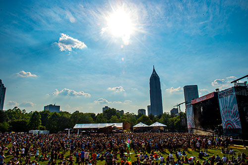 Thousands of people crowd toward the Peachtree Stage during the first day of the Shaky Knees Music Festival at Central Park in Atlanta on Friday, May 8, 2015. 