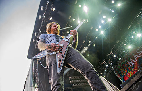 Mastodon's Brent Hinds performs on stage during the first day of the Shaky Knees Music Festival at Central Park in Atlanta on Friday, May 8, 2015. 