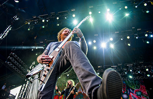 Mastodon's Brent Hinds performs on stage during the first day of the Shaky Knees Music Festival at Central Park in Atlanta on Friday, May 8, 2015. 