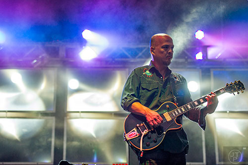 The Pixies' Joey Santiago performs on stage during the first day of the Shaky Knees Music Festival at Central Park in Atlanta on Friday, May 8, 2015. 