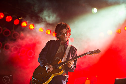 The Strokes' Nick Valensi performs on stage during the first day of the Shaky Knees Music Festival at Central Park in Atlanta on Friday, May 8, 2015. 