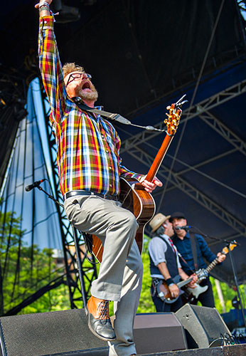 Flogging Molly's Dave King (left) Bob Schmidt and Dennis Casey perform on stage during the Shaky Knees Music Festival at Central Park in Atlanta on Saturday, May 9, 2015. 