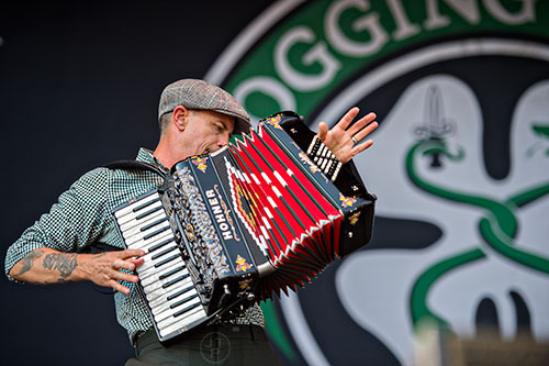 Flogging Molly's Matt Hensley performs on stage during the Shaky Knees Music Festival at Central Park in Atlanta on Saturday, May 9, 2015. 