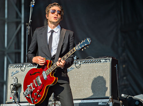 Interpol's Daniel Alexander Kessler performs on stage during the Shaky Knees Music Festival at Central Park in Atlanta on Saturday, May 9, 2015. 