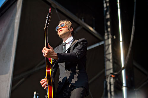 Interpol's Daniel Alexander Kessler performs on stage during the Shaky Knees Music Festival at Central Park in Atlanta on Saturday, May 9, 2015. 
