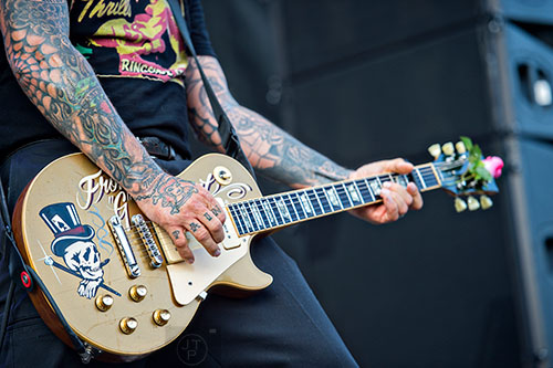 Social Distortion's Mike Ness performs on stage during the Shaky Knees Music Festival at Central Park in Atlanta on Saturday, May 9, 2015.