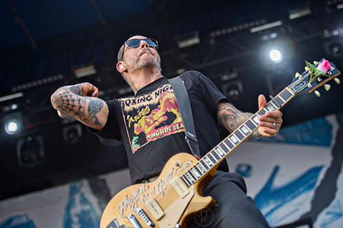 Social Distortion's Mike Ness performs on stage during the Shaky Knees Music Festival at Central Park in Atlanta on Saturday, May 9, 2015. 