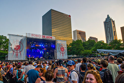 Wilco performs on stage as the sun sets during the Shaky Knees Music Festival at Central Park in Atlanta on Saturday, May 9, 2015. 