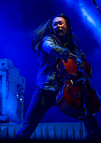 The Avett Brothers' Joe Kwon performs during the Shaky Knees Music Festival at Central Park in Atlanta on Saturday, May 9, 2015. 