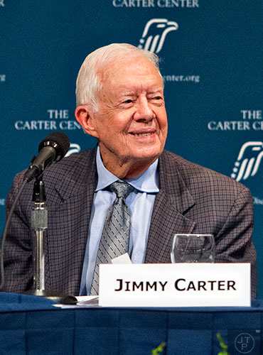 Former U.S. President Jimmy Carter listens to comments and suggestions during the inaugural World Summit to End Sexual Exploitation at the Carter Center in Atlanta on Tuesday, May 12, 2015.    