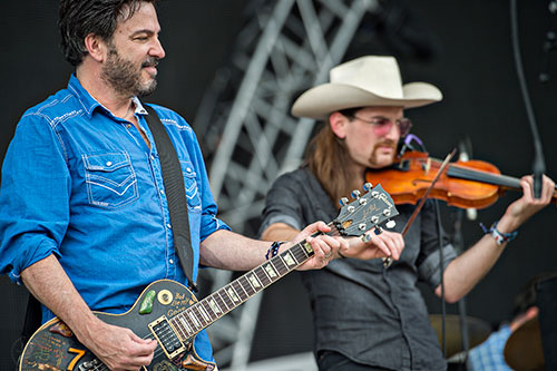 Cracker's Johnny Hickman (left) performs during the Shaky Boots Music Festival at Kennesaw State University on Sunday, May 17, 2015. 