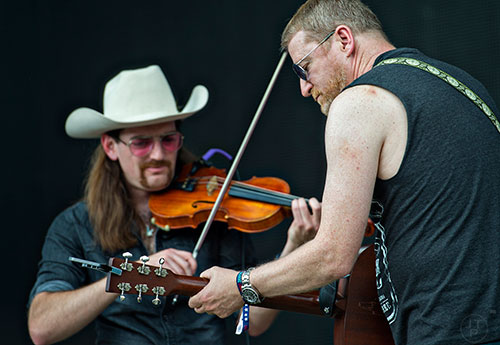 Cracker's David Lowery (right) performs during the Shaky Boots Music Festival at Kennesaw State University on Sunday, May 17, 2015. 