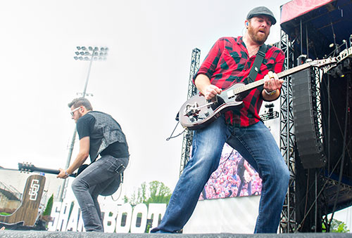 The Eli Young Band's James Young (right) and Chris Thompson perform during the Shaky Boots Music Festival at Kennesaw State University on Sunday, May 17, 2015. 