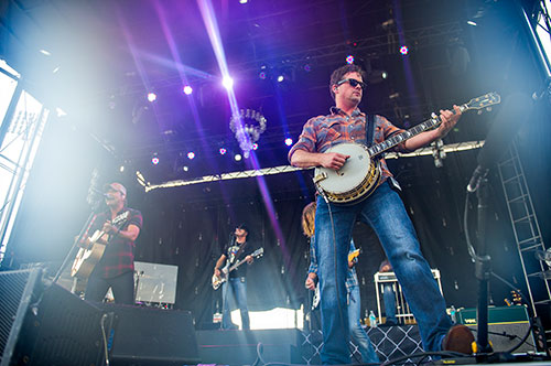Liam Bailey (right), performs with Rodney Atkins during the Shaky Boots Music Festival at Kennesaw State University on Sunday, May 17, 2015. 