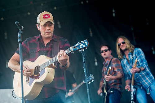 Rodney Atkins (left) performs during the Shaky Boots Music Festival at Kennesaw State University on Sunday, May 17, 2015. 