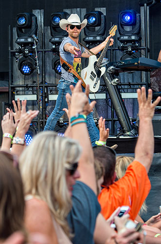 Justin Moore performs during the Shaky Boots Music Festival at Kennesaw State University on Sunday, May 17, 2015. 