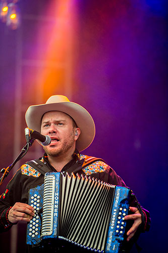 Old Crow Medicine Show's Critter Fuqua performs during the Shaky Boots Music Festival at Kennesaw State University on Sunday, May 17, 2015. 