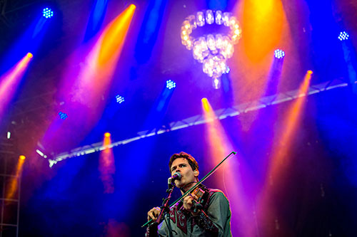 Old Crow Medicine Show's Ketch Secor performs during the Shaky Boots Music Festival at Kennesaw State University on Sunday, May 17, 2015. 