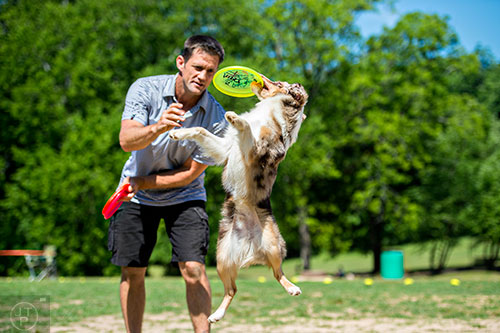 Dean Werts performs with his dog Kixx during Bark at the Park at Brookhaven Park on Saturday, May 23, 2015.  