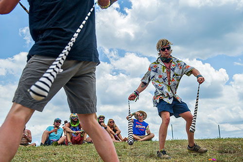 Samuel Cutshaw (right) and Trevor Pinkerton dance as The Bixel Boys perform during the CounterPoint Festival at Kingston Downs in Rome on Sunday, May 24, 2015. 