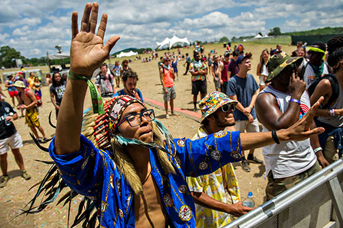 Bryan Barrios (left) dances as Sango performs during the CounterPoint Festival at Kingston Downs in Rome on Sunday, May 24, 2015. 