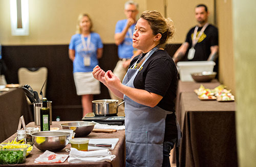 Chef Dena Marino speaks about her career after demonstrating how to prepare freshly sourced ingredients to cook healthier Italian dishes during the Atlanta Food & Wine Festival at Loews Atlanta Hotel in Midtown on Saturday, May 30, 2015. 