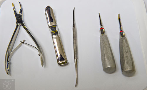 Some of the dentistry tools used to pull teeth at Mercy Care's dental clinic off of Decatur St. in Atlanta on Tuesday, May 19, 2015. 