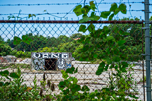 Graffiti marks the outside of a possible quarry along a section of yet to be developed Atlanta Beltline Trail on Friday, May 29, 2015.