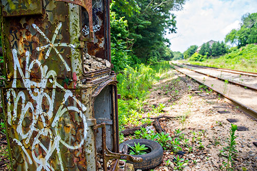 Train tracks mark the path on a section of yet to be developed Atlanta Beltline Trail on Friday, May 29, 2015.